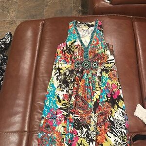 Brand new with tags, eci dress.    Beading in the middle/waist